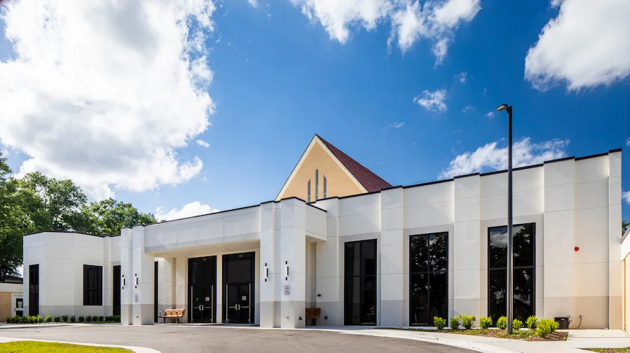 The Forest Lake Church sanctuary building on a clear morning